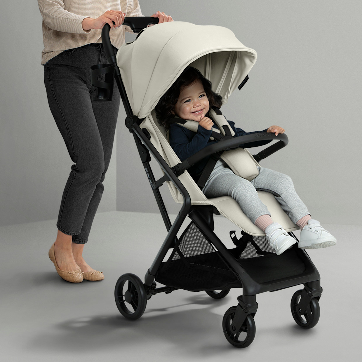 Delta Children Icon Ultra Compact Lightweight Everyday & Travel Stroller - Cream.