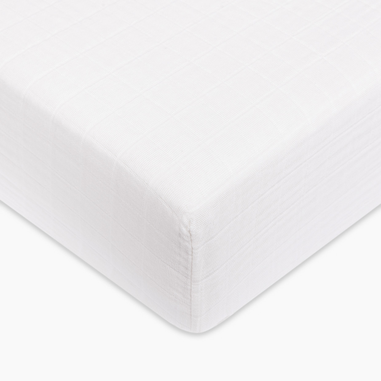 babyletto Crib Sheet in GOTS Certified Organic Muslin Cotton - White.