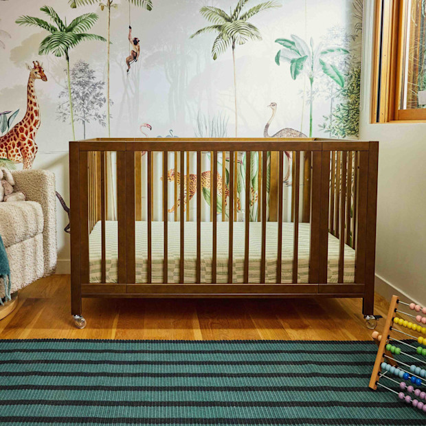 babyletto Rolli 9-in-1 Convertible All-Stages Crib with Bassinet & Toddler Bed Conversion Kits.