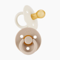 Itzy Ritzy Natural Rubber Pacifiers, Set of 2 – Natural Rubber Newborn Pacifiers with Cherry-Shaped Nipple & Large Air Holes for Added Safety; Set of 2 in Coconut & Toast, Ages 0 – 6 Months