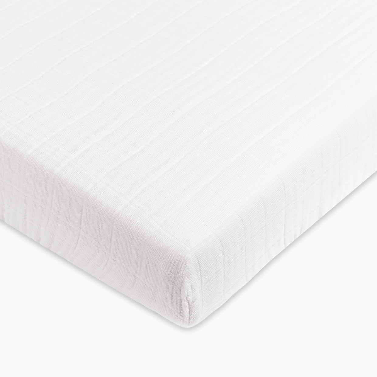 babyletto Mini Crib Sheet in GOTS Certified Organic Muslin Cotton - White.