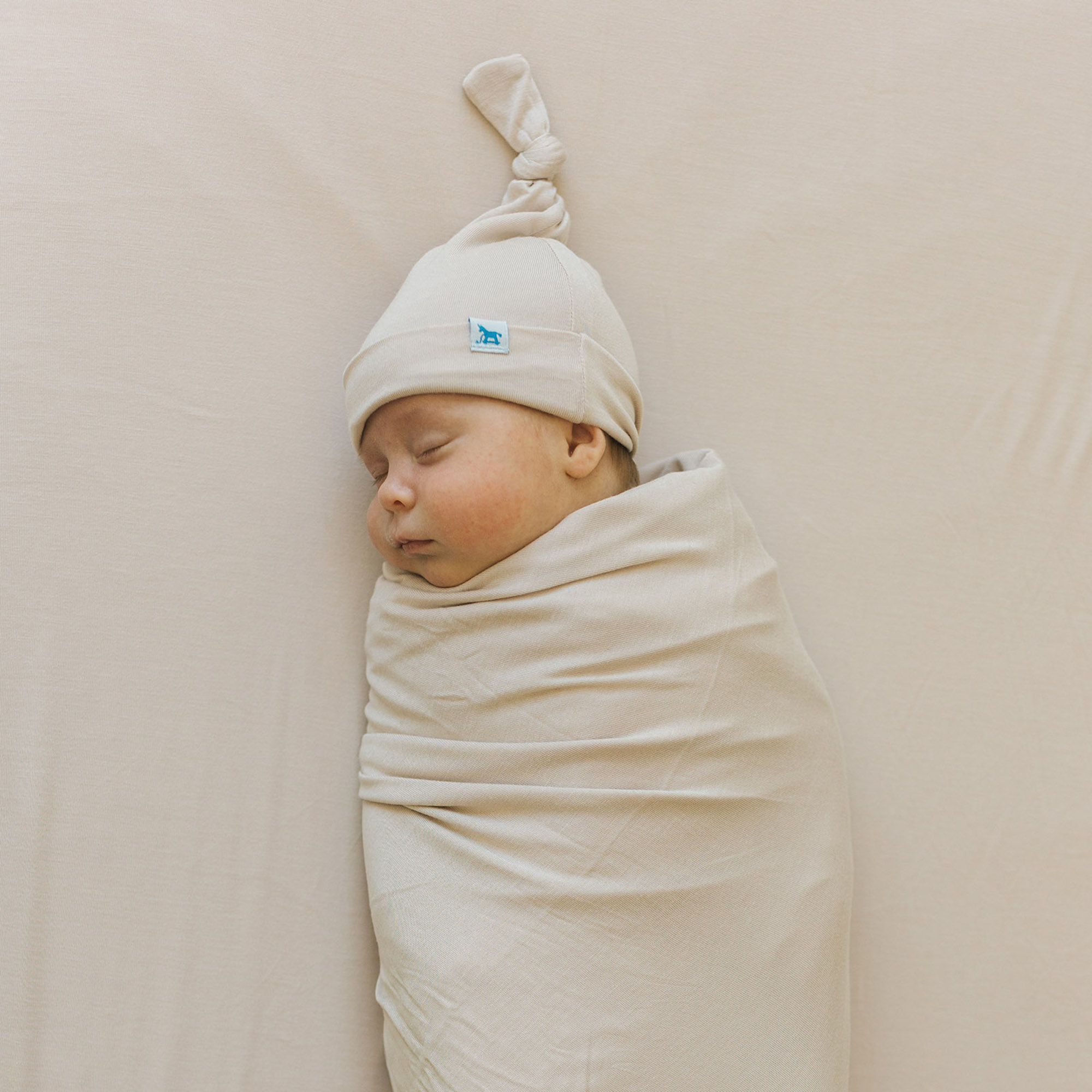 Little Unicorn Stretch Knit Hat & Swaddle Pebble Babylist Shop