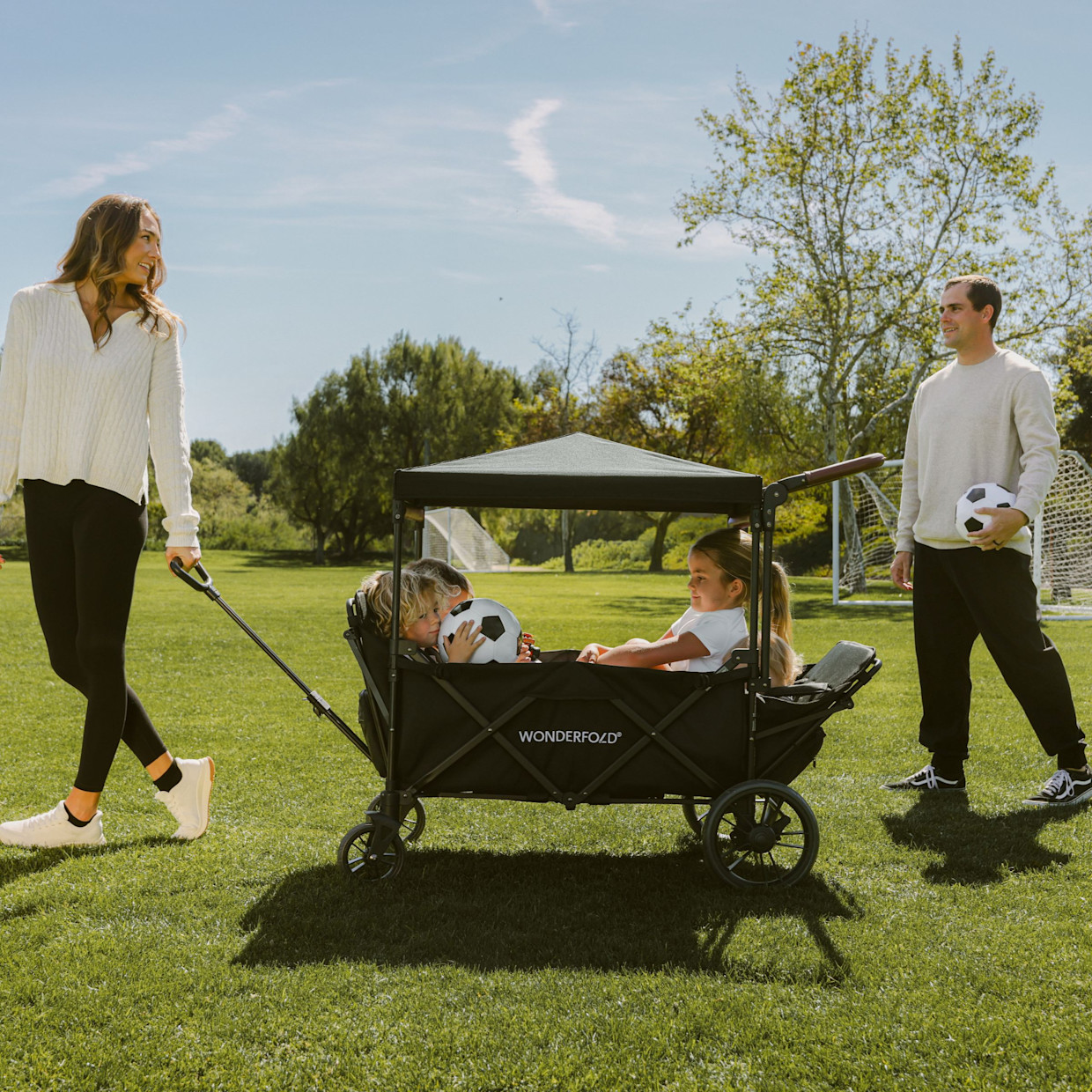 WonderFold Wagon Push & Pull Quad Stroller Wagon - Black.