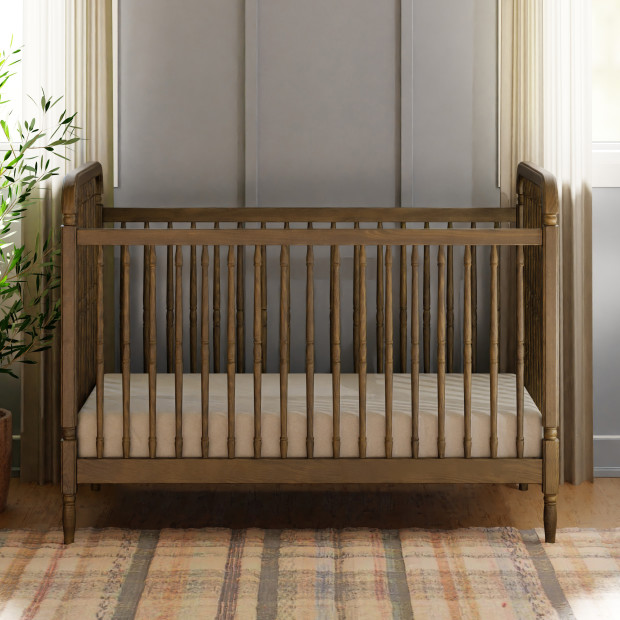 Namesake Liberty 3-in-1 Spindle Crib with Toddler Bed Conversion Kit - Natural Walnut.