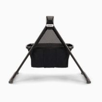 Flat lay view of the black Nuna bassinet.