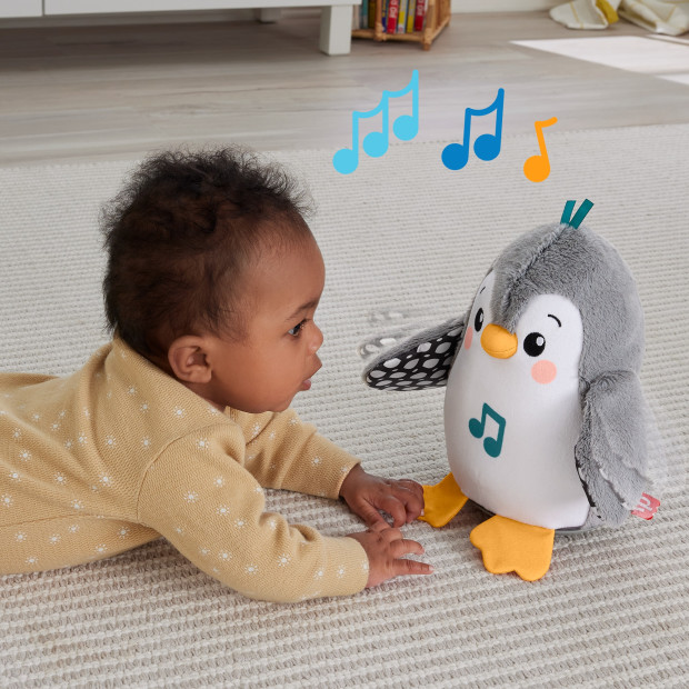 Fisher-Price Flap & Wobble Penguin Musical Plush Toy.