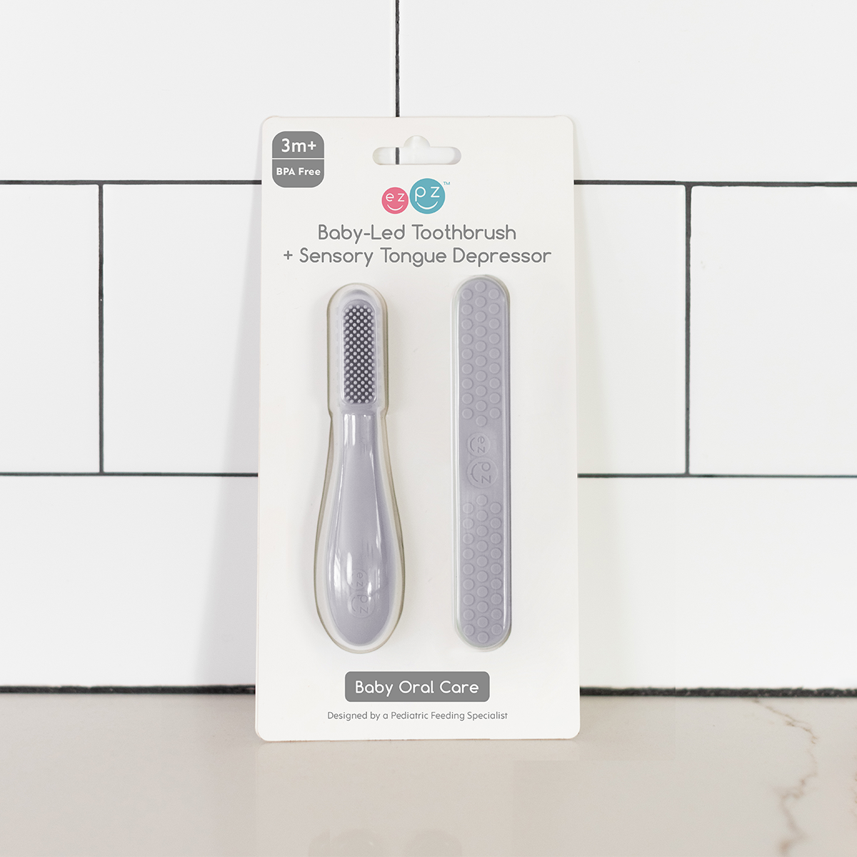 ezpz Baby-Led Toothbrush + Sensory Tongue Depressor Dual Pack - Pewter.