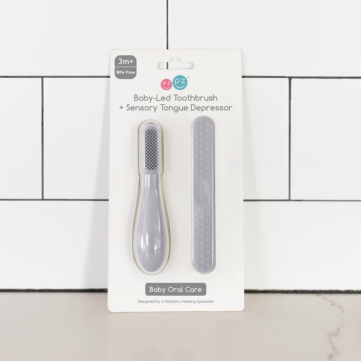 ezpz Baby-Led Toothbrush + Sensory Tongue Depressor Dual Pack - Pewter.