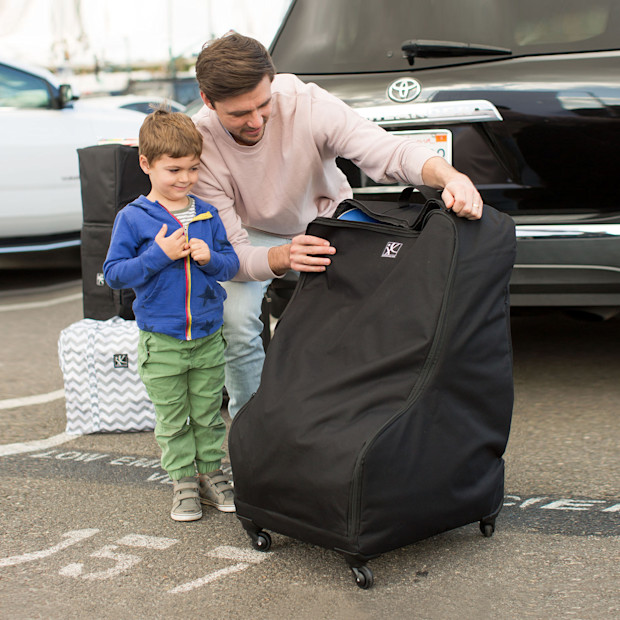 Jl Childress Deluxe Spinner Wheelie Car Seat Bag Babylist Jl Childress Deluxe Spinner Wheelie Car