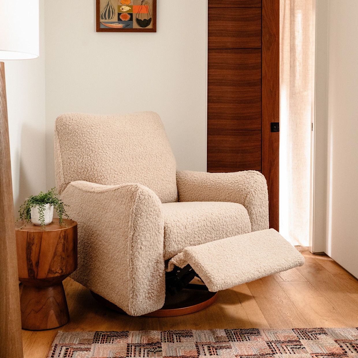 Nursery Works Sunday Power Recliner and Swivel Glider - Chai Shearling With Dark Wood Base.