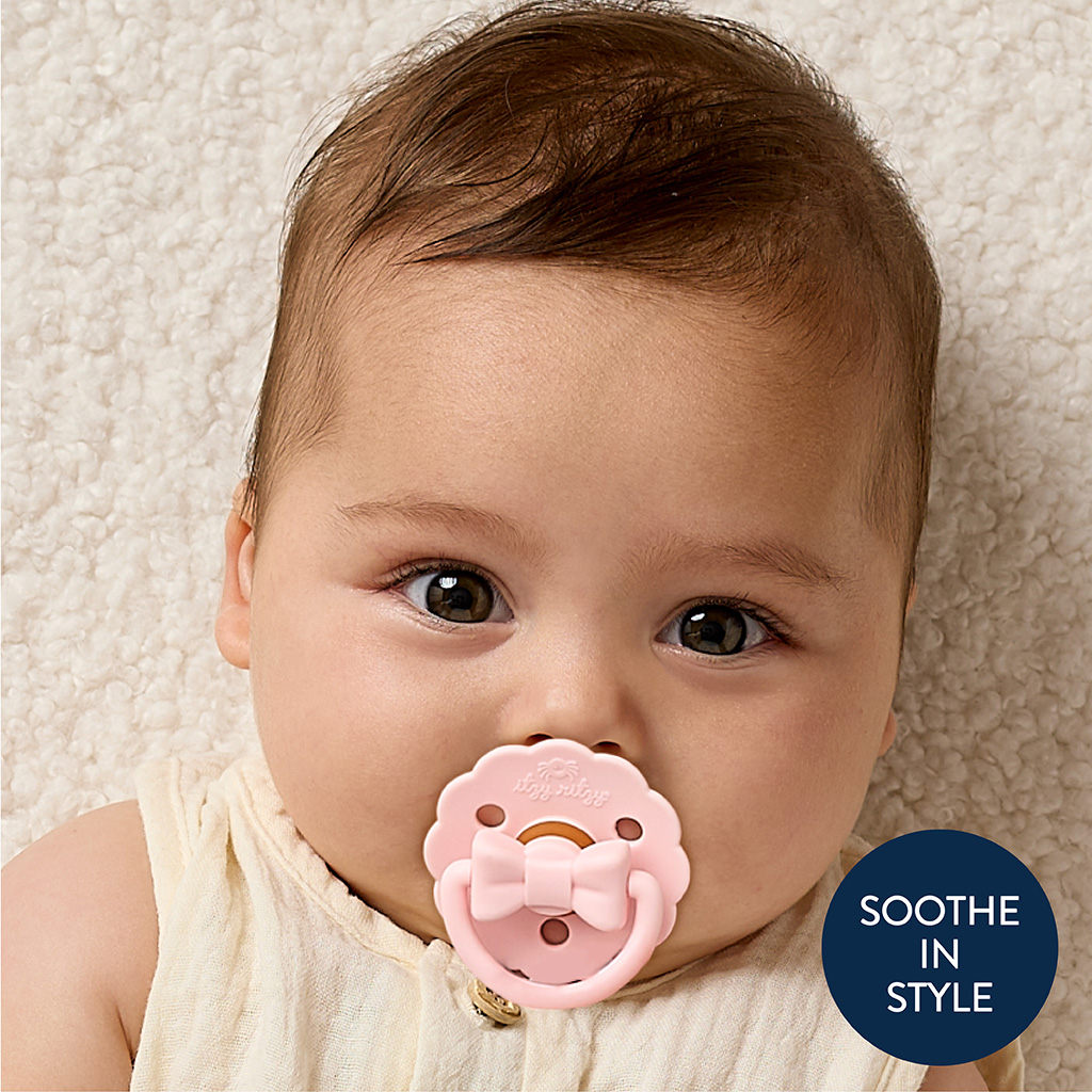 Itzy Ritzy Itzy Soother Natural Rubber Pacifier - Bow, 0-6.
