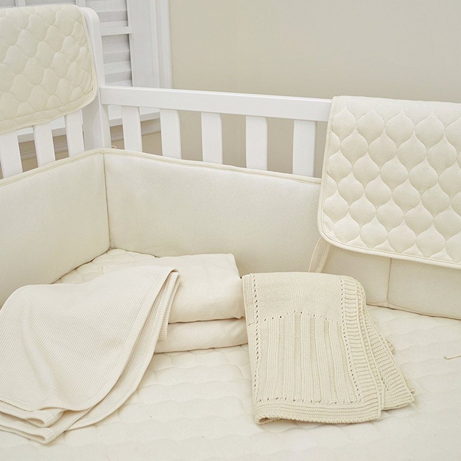 crib sheet saver pad