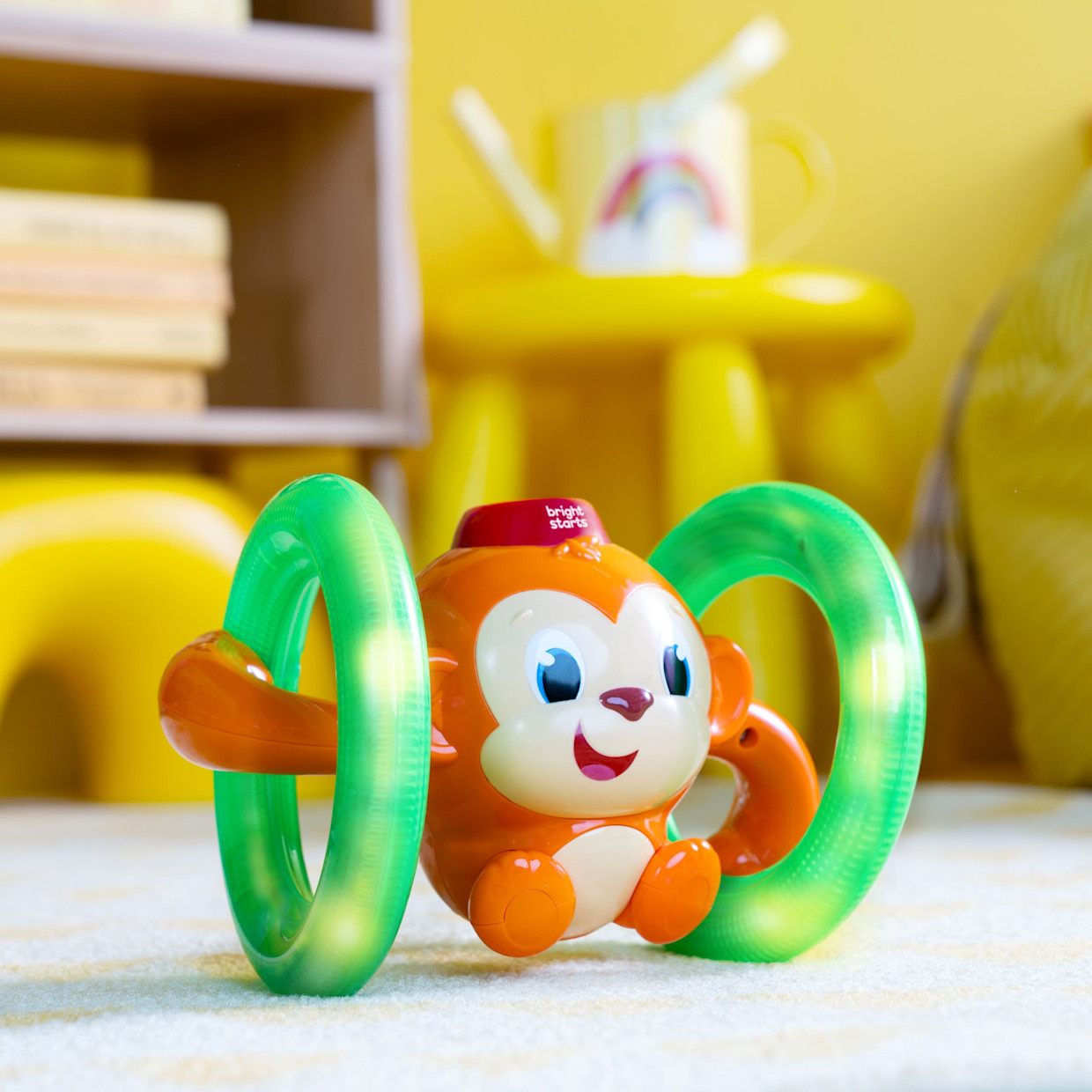 Bright Starts Roll & Glow Monkey Crawl & Chase Toy.
