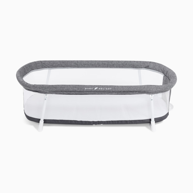 Baby Delight Snuggle Nest Portable Bassinet.