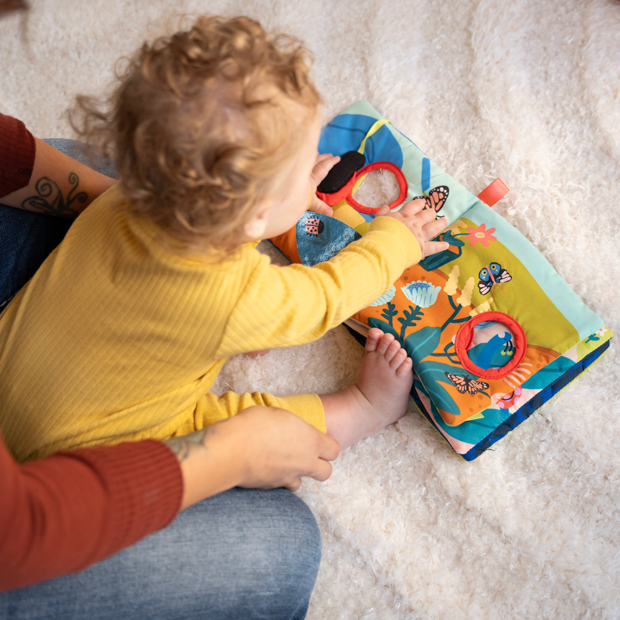 Manhattan Toy Bugging Through Sensory Book.