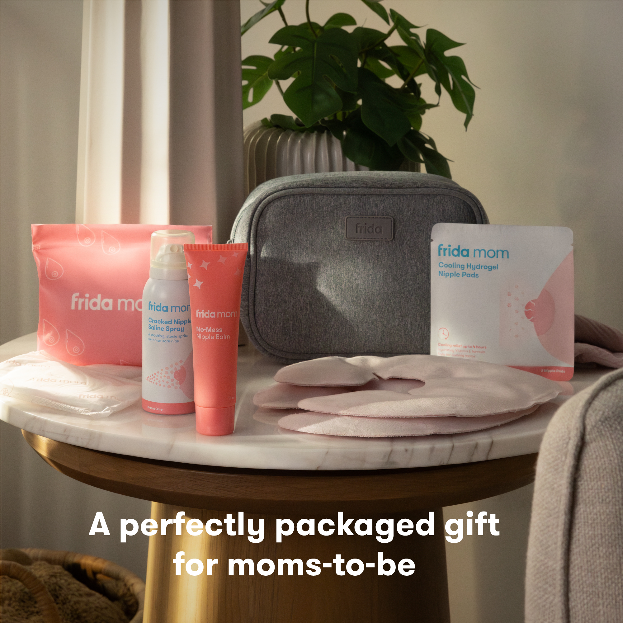 Frida Mom Breastfeeding Survival Kit - White.