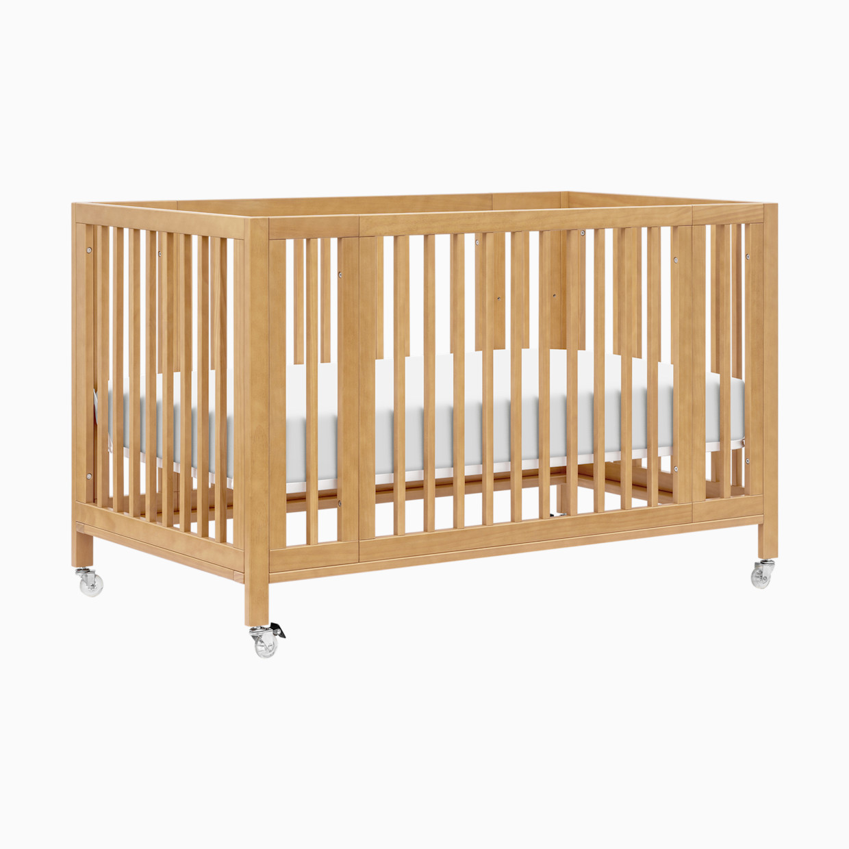 babyletto Rolli 9-in-1 Convertible All-Stages Crib with Bassinet & Toddler Bed Conversion Kits - Honey.