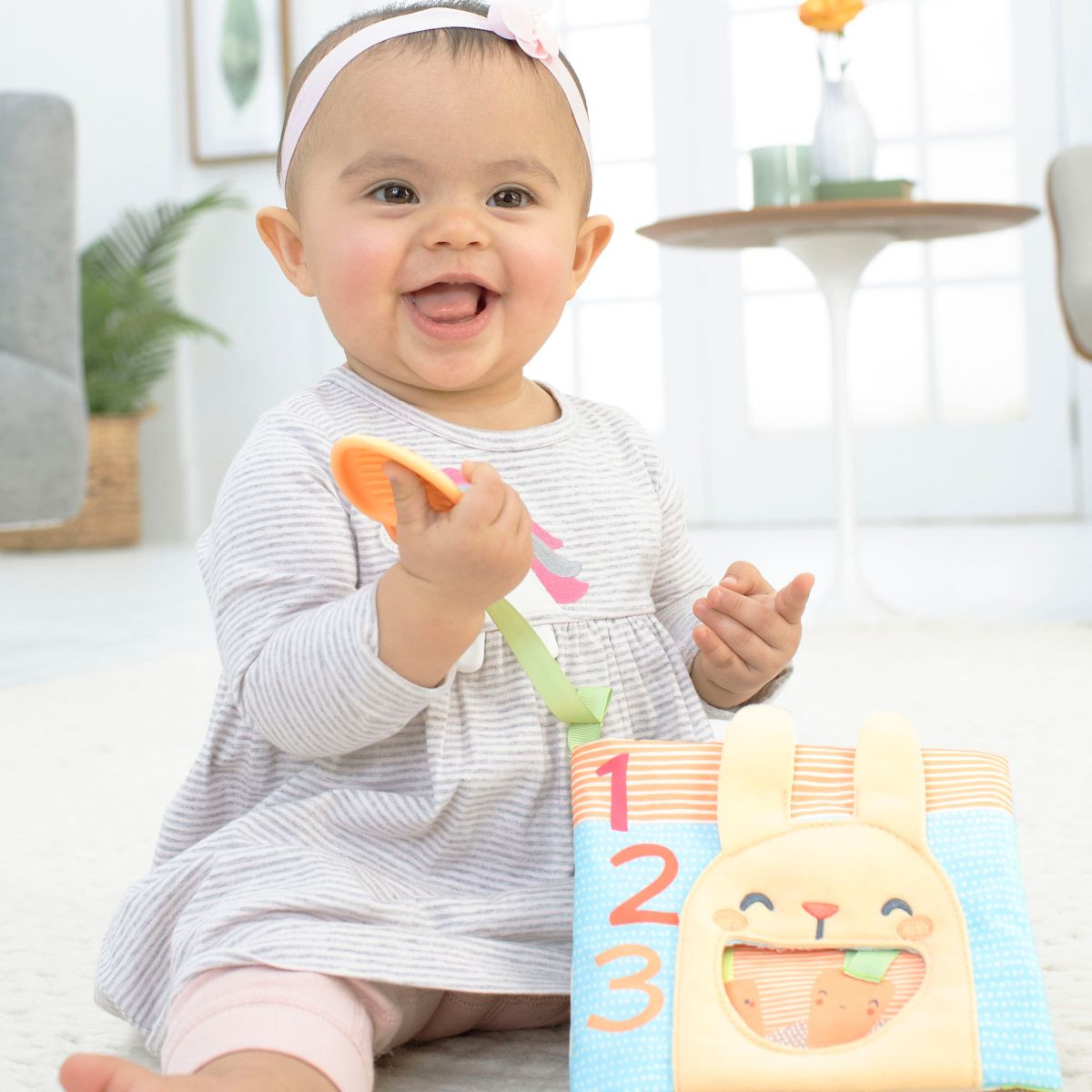 Skip Hop Farmstand Soft Activity Book.