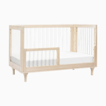 Crib with toddler rail in a single image