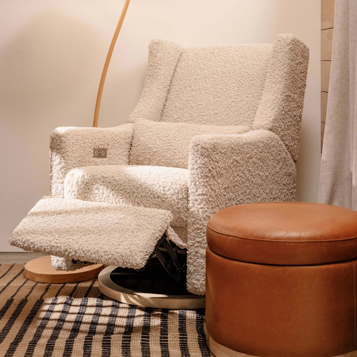 babyletto Kiwi Electronic Recliner and Swivel Glider - Almond Teddy Loop With Light Wood Base.