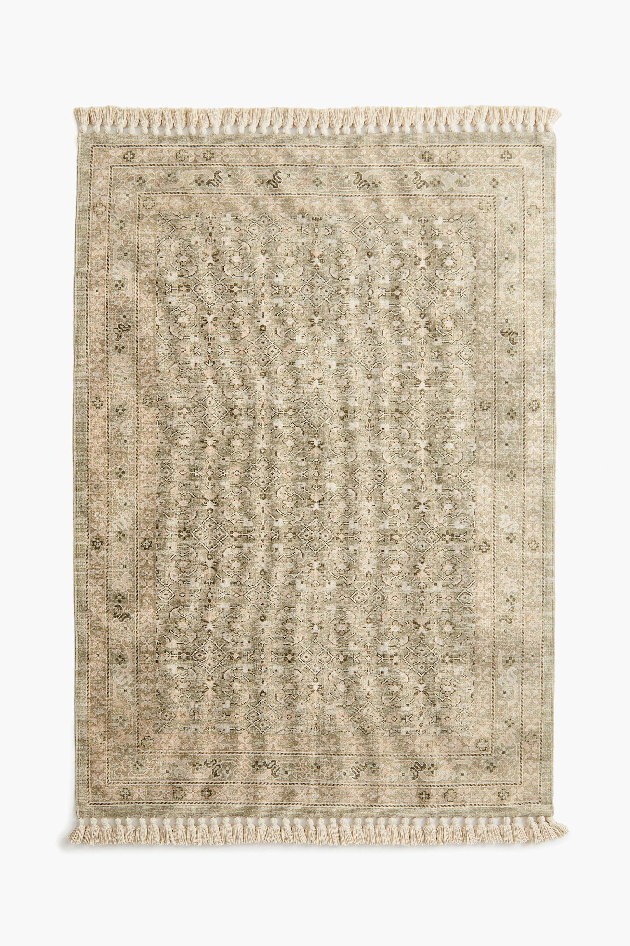 H&M Patterned Rug with Fringe.