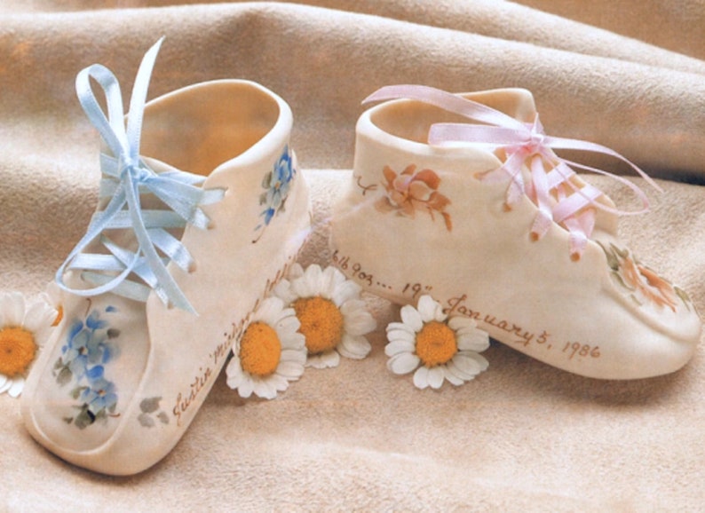 Porcelain by Delong Hand Painted Bisque Porcelain Baby Shoe.