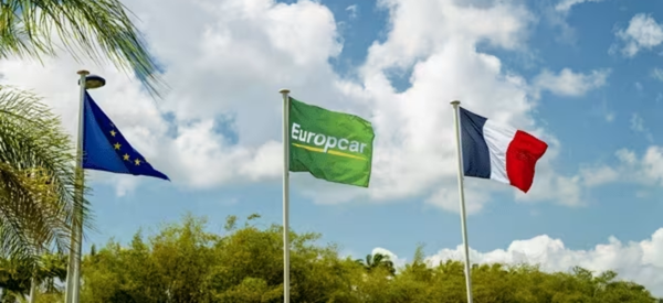 The European flag, the Europcar flag, and the French flag