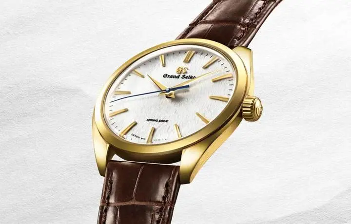 Grand Seiko Elegance collection: 20th anniversary edition of Spring Drive 18k gold and features the “Snowflake” dial