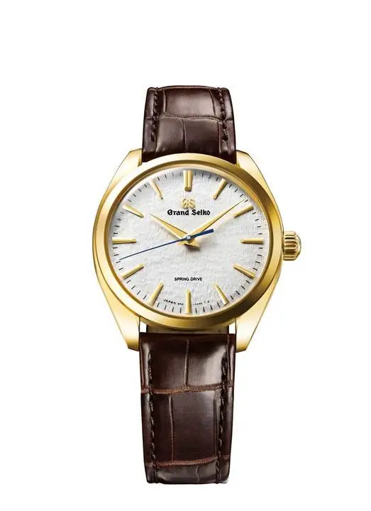 Grand Seiko Elegance collection: 20th anniversary edition of Spring Drive 18k gold and features the “Snowflake” dial