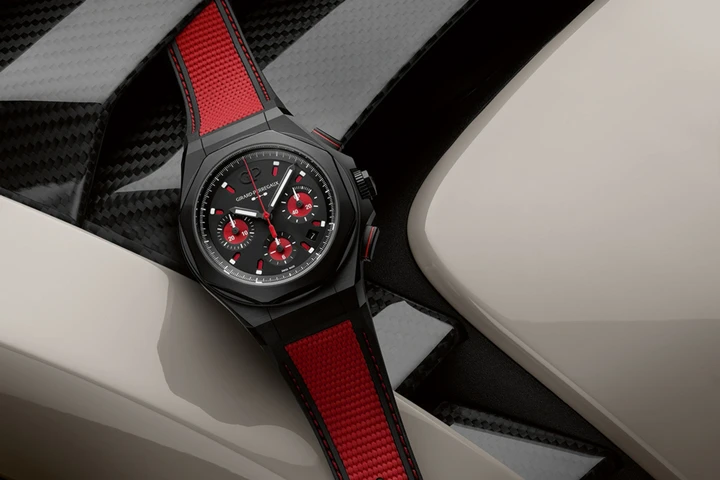 Girard-Perreguax’s Laureato Absolute Passion Mat black dial strap made of a supple and resistant FKM rubber, red inlay and stitches