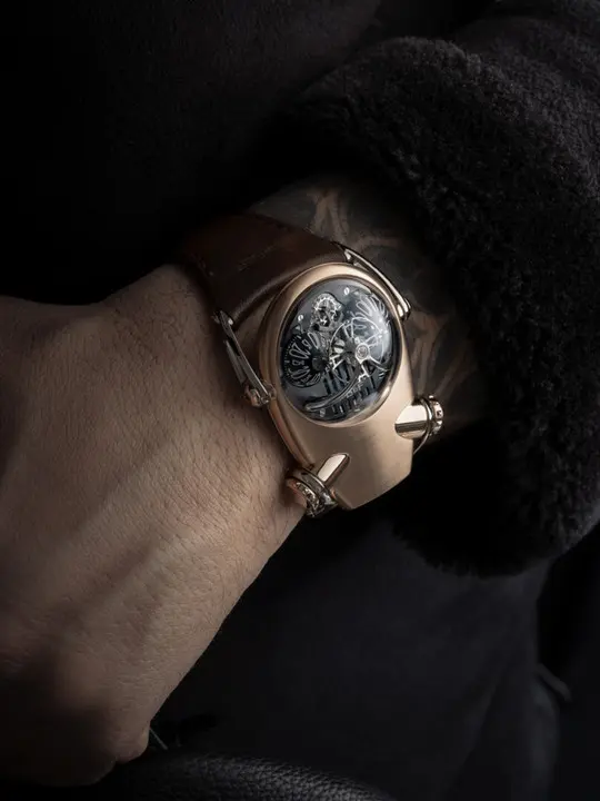 MB&F Horological Machine N°10 ‘Bulldog’  18k red-gold and titanium body with black “eyes”