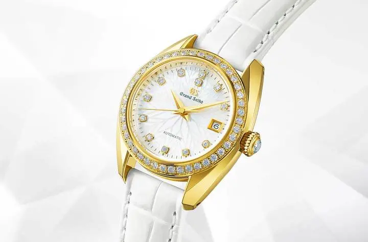  Grand Seiko automatic caliber 9S27 with 42 diamonds on each bezel and 12 into each mother-of-pearl dial. 