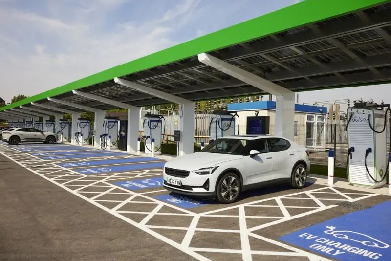 A photo of the EV charging hub at NEC Birmingham. You can see two cars being charged