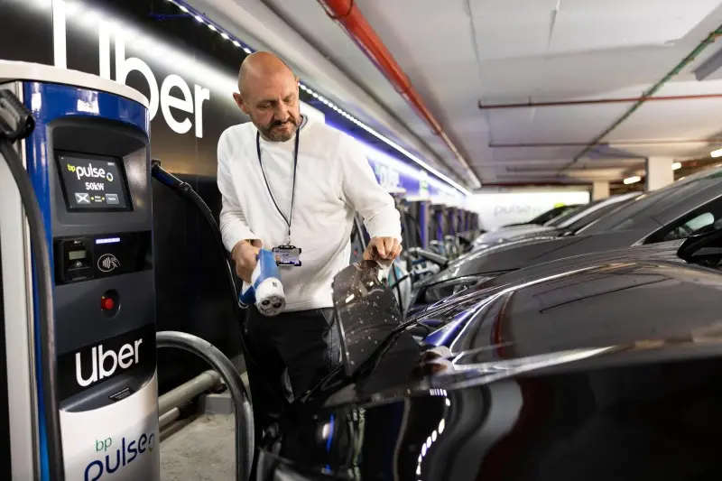 A photo of an Uber driver charging his car at one of the bp pulse charging sites. 