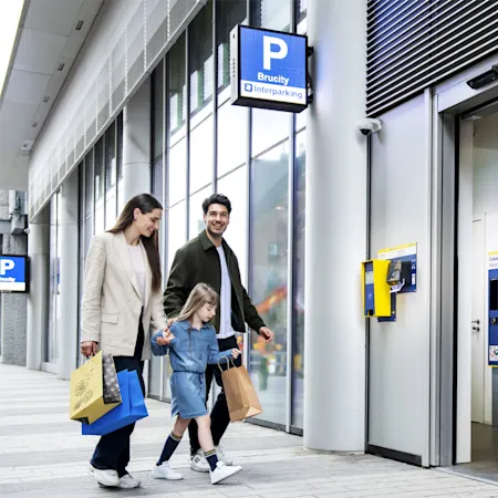 Family in front of Brucity car park