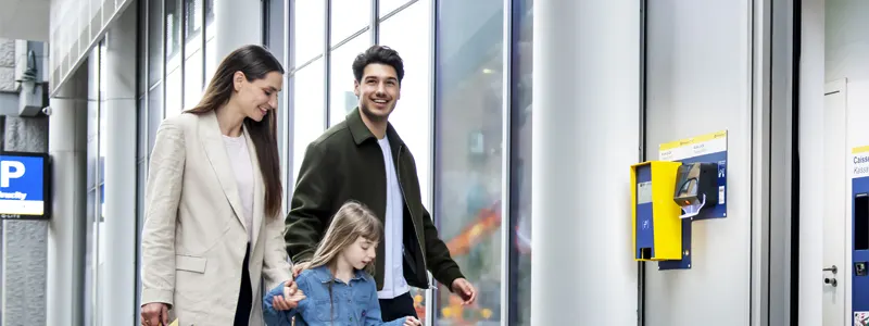 Family in front of Brucity car park