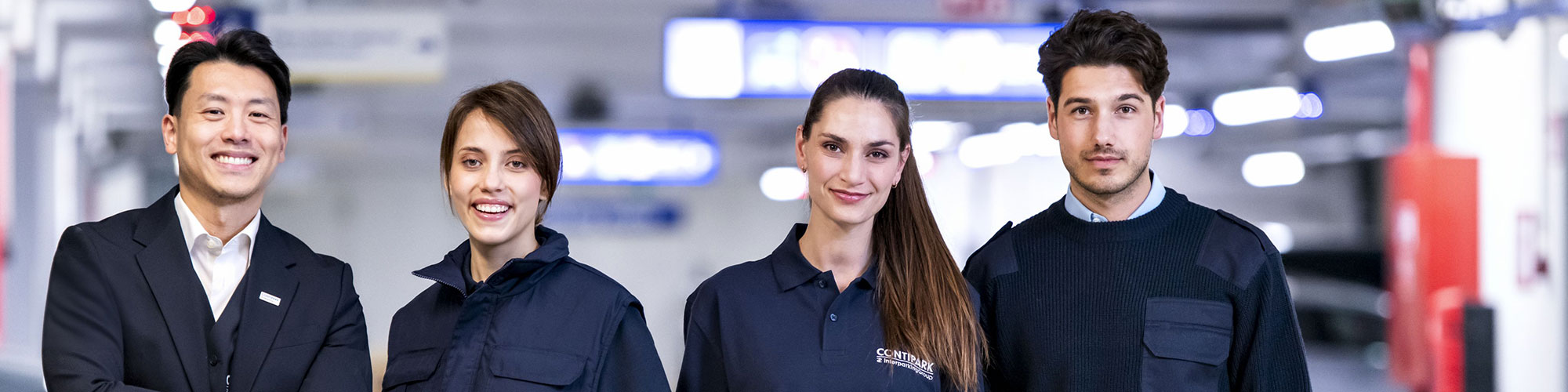 Contipark Team arbeiten zusammen im Parkhaus