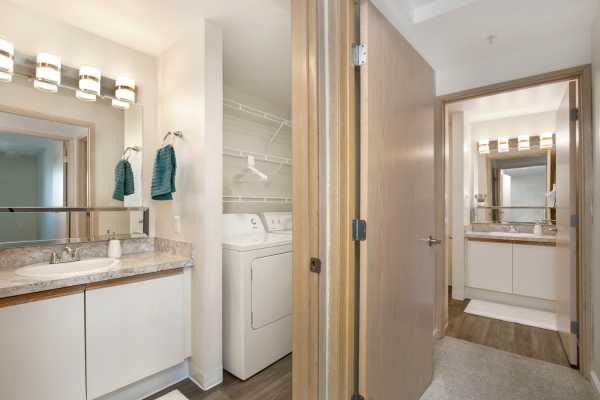 Bathroom and laundry at Casa Blanca apartments.