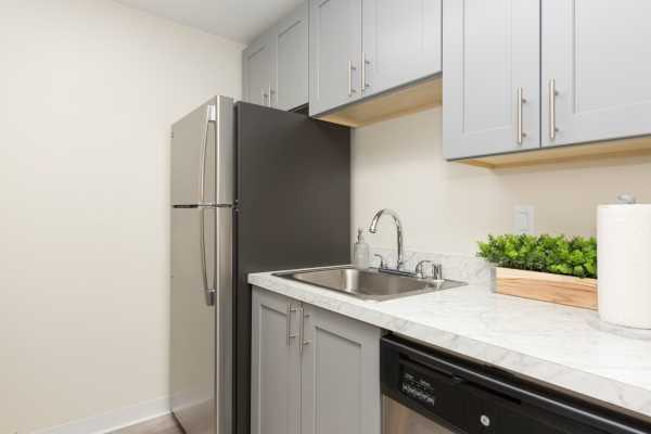 Photo of kitchen counters and utilities at Casa Blanca apartments.