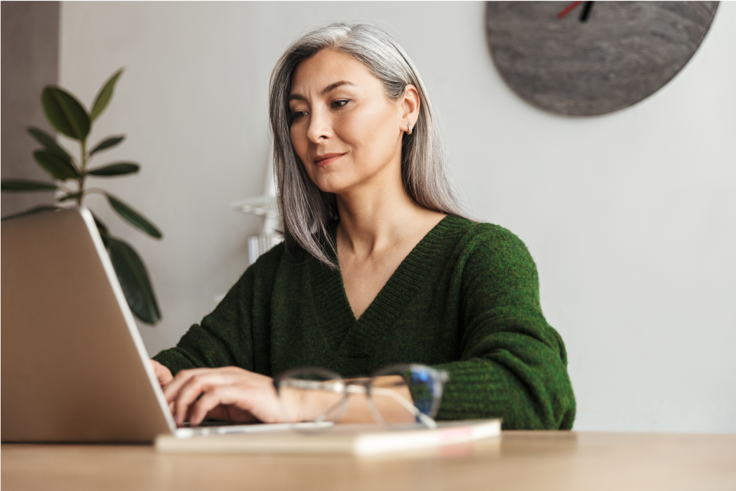 Woman on laptop at Table