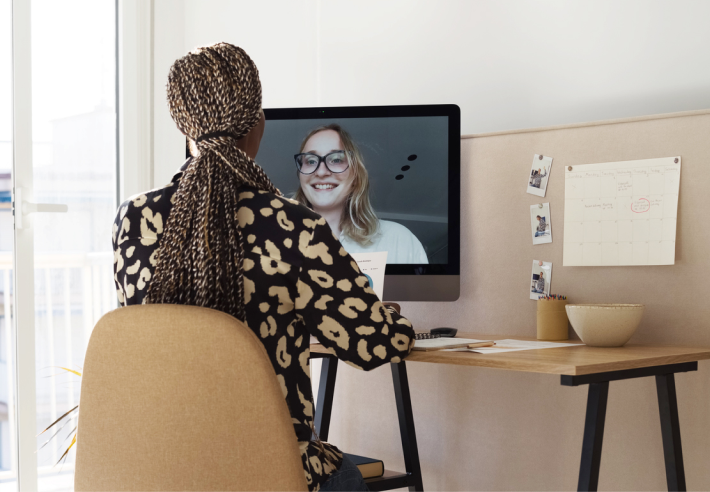 Women with her back to us in virtual one on one training Session