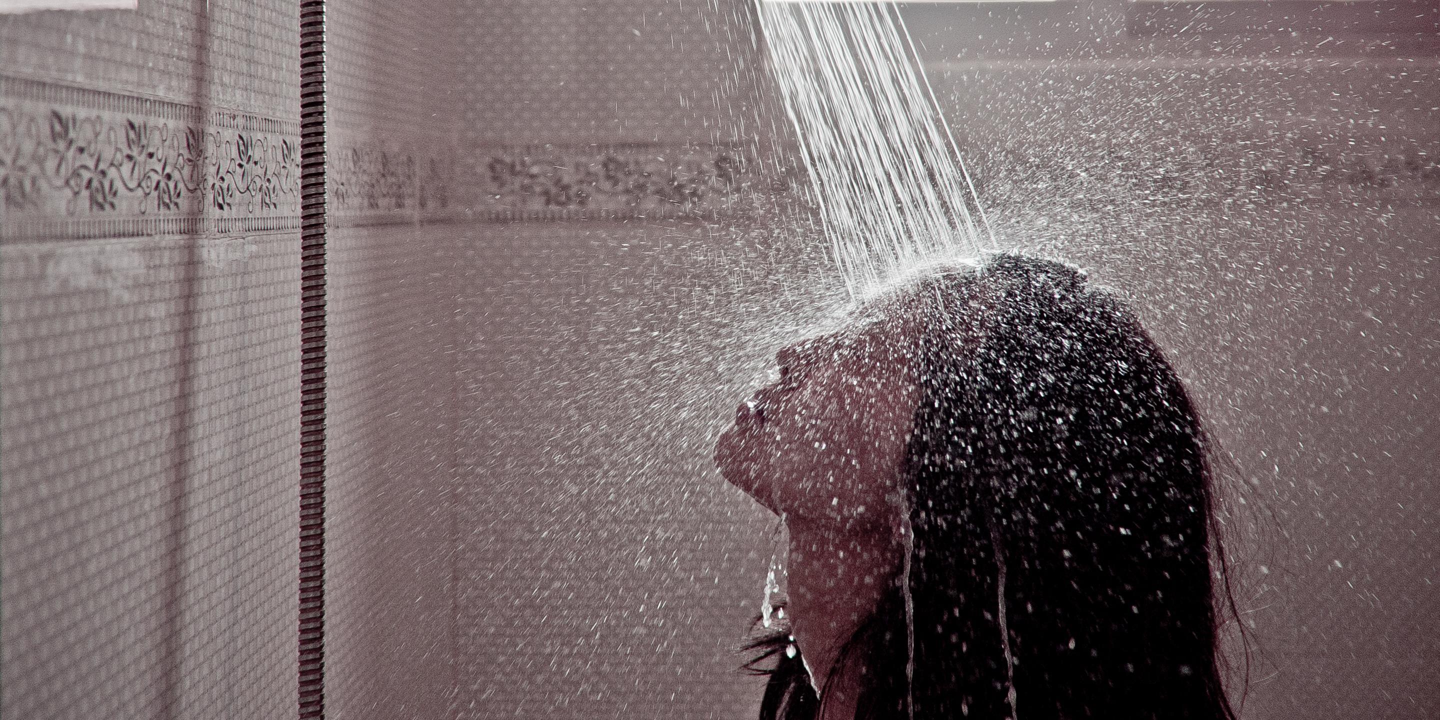 Asian Athletes Showering