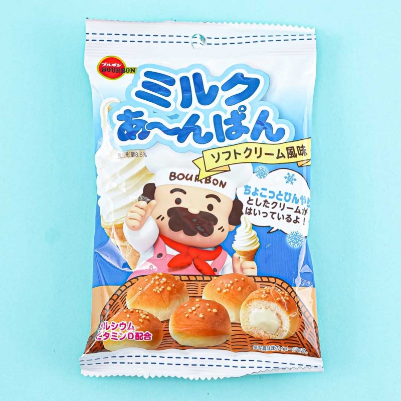 A sweets package: there's a little chef character with a bushy mustache holding an ice cream cone. A big ice cream cone hovers in the background. In the foreground are little round balls; one is cut open to show cream inside.