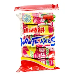 A bag of Haw Flakes, which each come in a squat tube format