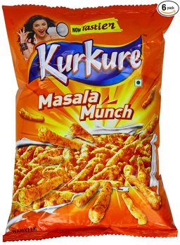 A bag of Masala Munch in bright orange colors. A woman is excitedly shouting into a megaphone "now tastier"