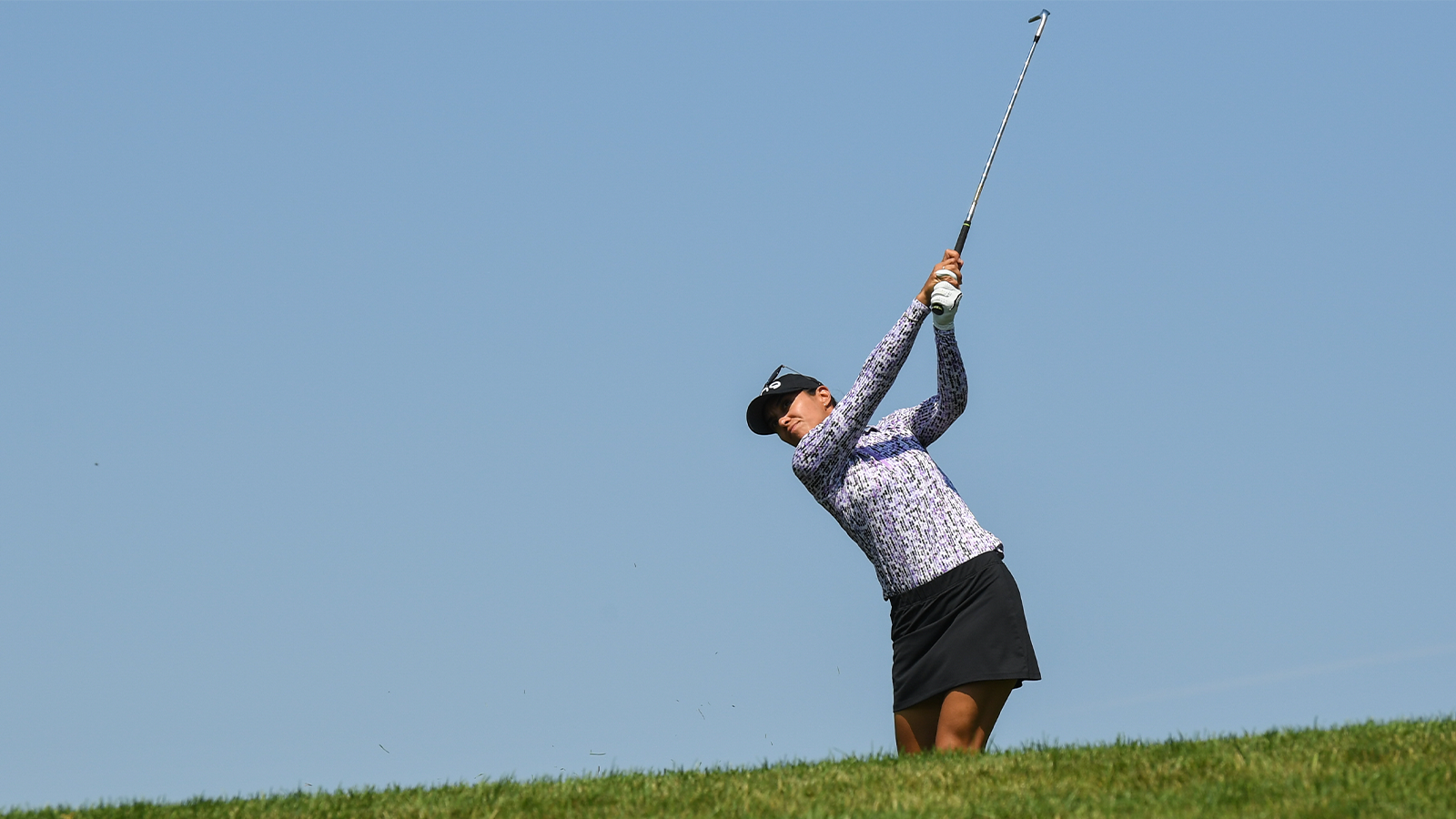 Paula Reto of South Africa hits her shot from the fairway on the ninth hole during the final round for the 2022 KPMG Women's PGA Championship at Congressional Country Club on June 26, 2022 in Bethesda, Maryland. (Photo by Montana Pritchard/PGA of America)