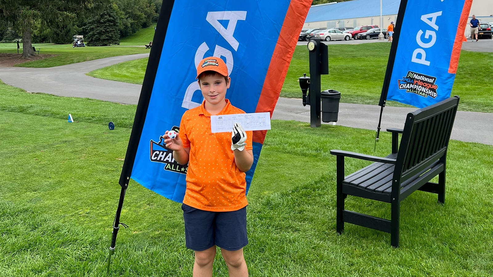 Kai Nafziger from the Berkshires All-Stars celebrates a hole-in-one at the Region 2 National Car Rental PGA Jr. League Regional Championship at Drumlins Country Club in Syracuse, NY. 