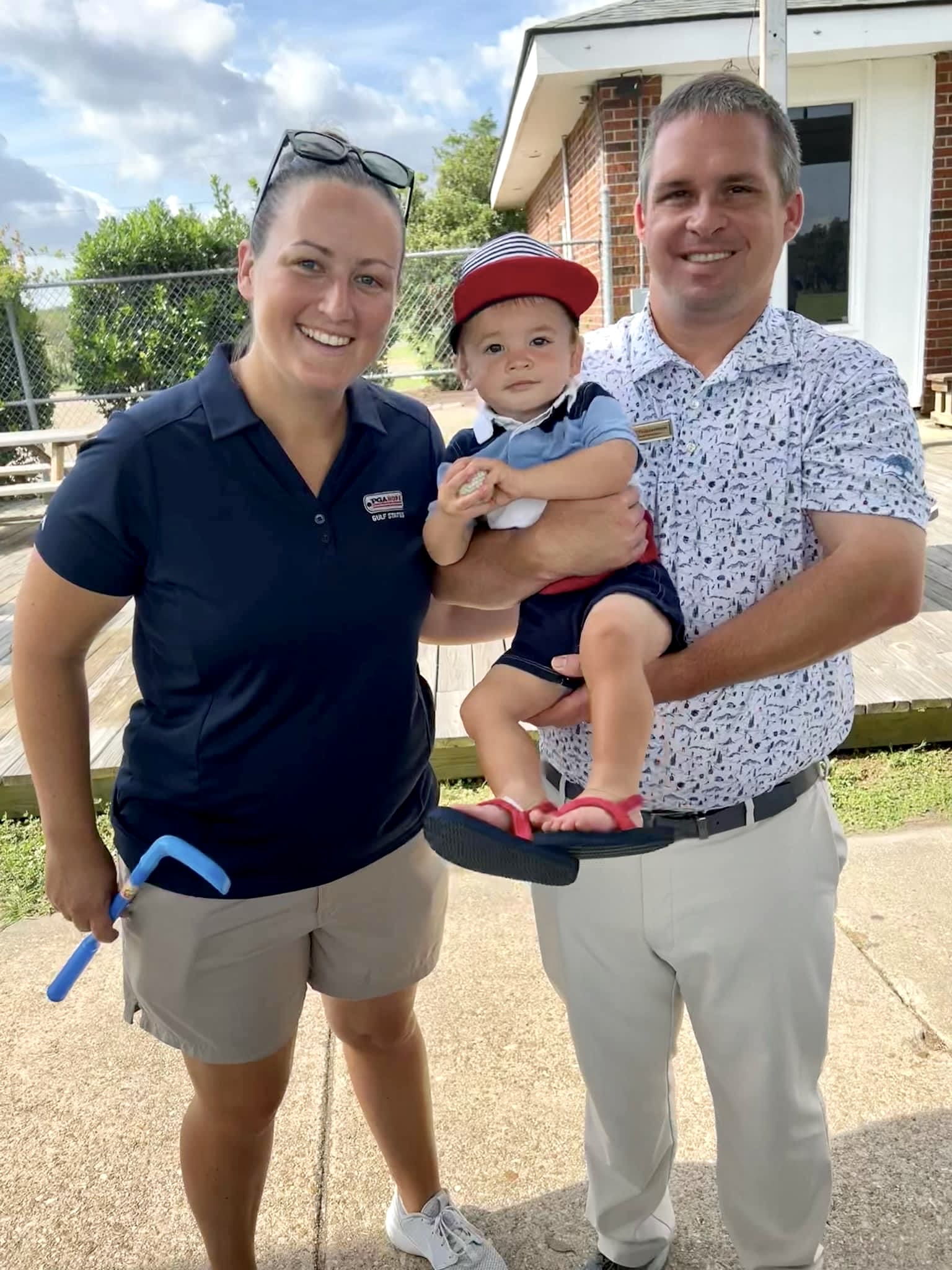 Morgan & Matt Williamson at the course with their son. 