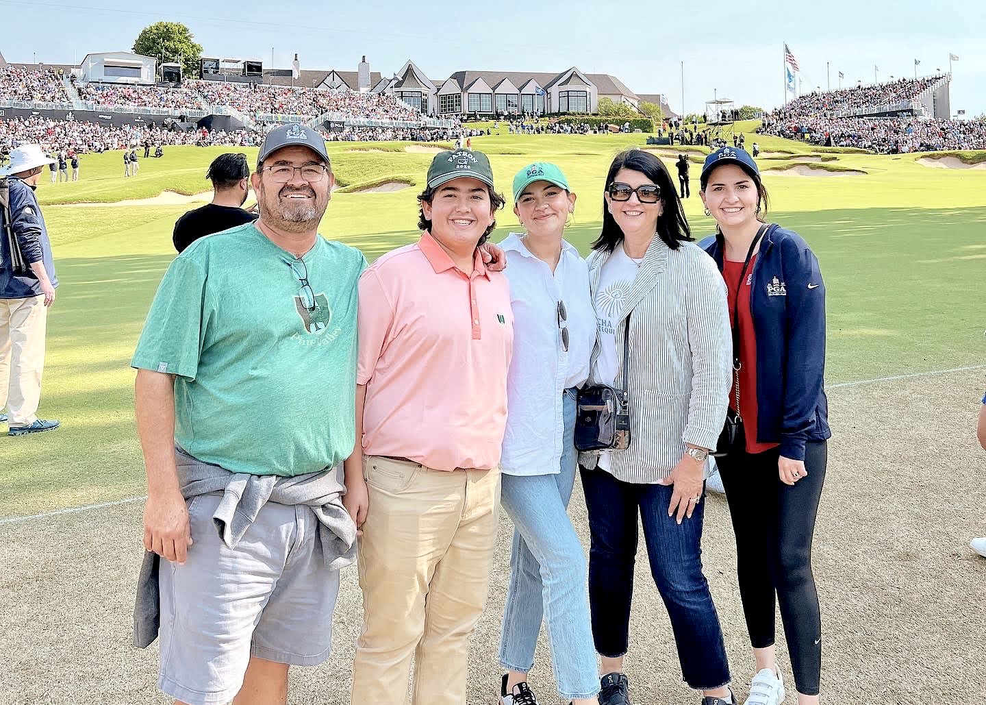 Davila (middle) and her family at the 2022 PGA Championship at Southern Hills in Oklahoma.