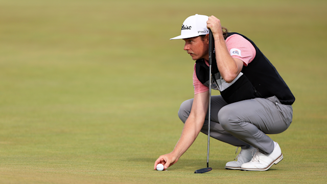 Cameron Smith of Australia lines up a putt on the 15th green at St Andrews Old Course.